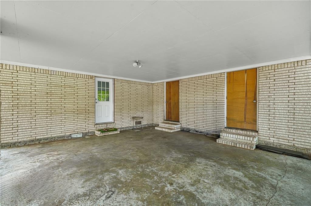 1393 Idlewood Road Tucker, GA 30084 - Photo 31 of 32 an empty room with windows