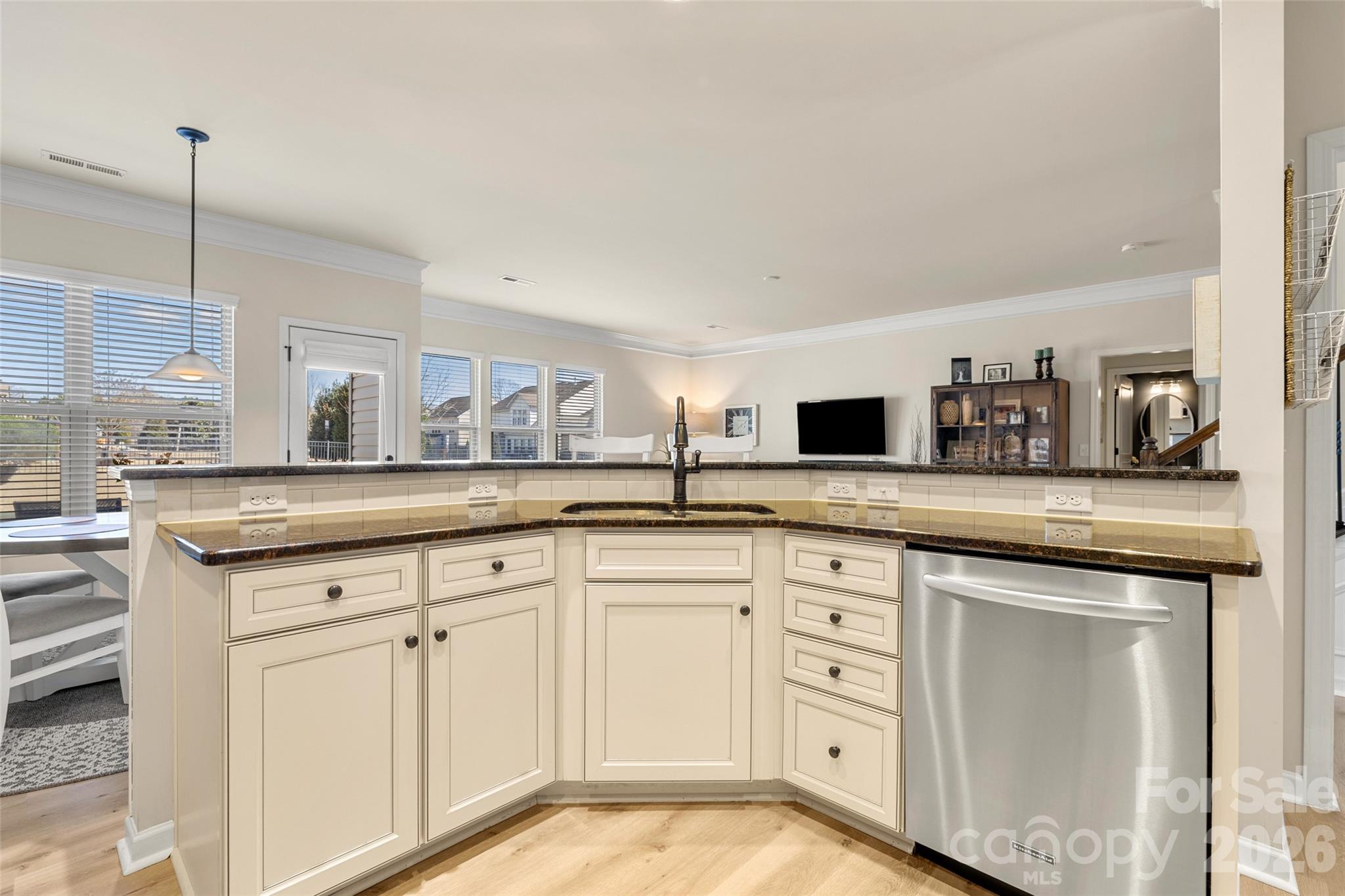 3534 Jumprock Road Fort Mill, SC 29707 - Photo 12 of 36 a kitchen with white cabinets and sink