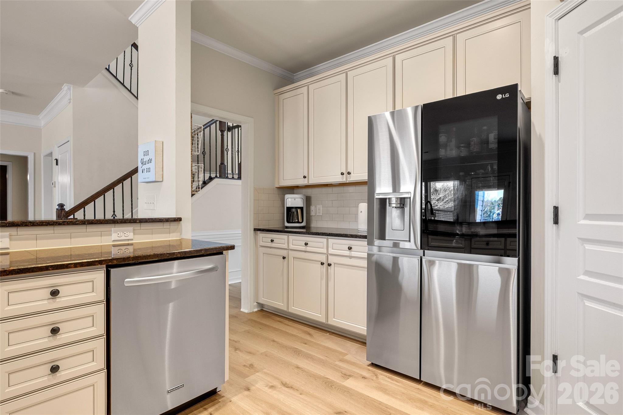 3534 Jumprock Road Fort Mill, SC 29707 - Photo 13 of 36 a kitchen with stainless steel appliances granite countertop a refrigerator and a stove top oven