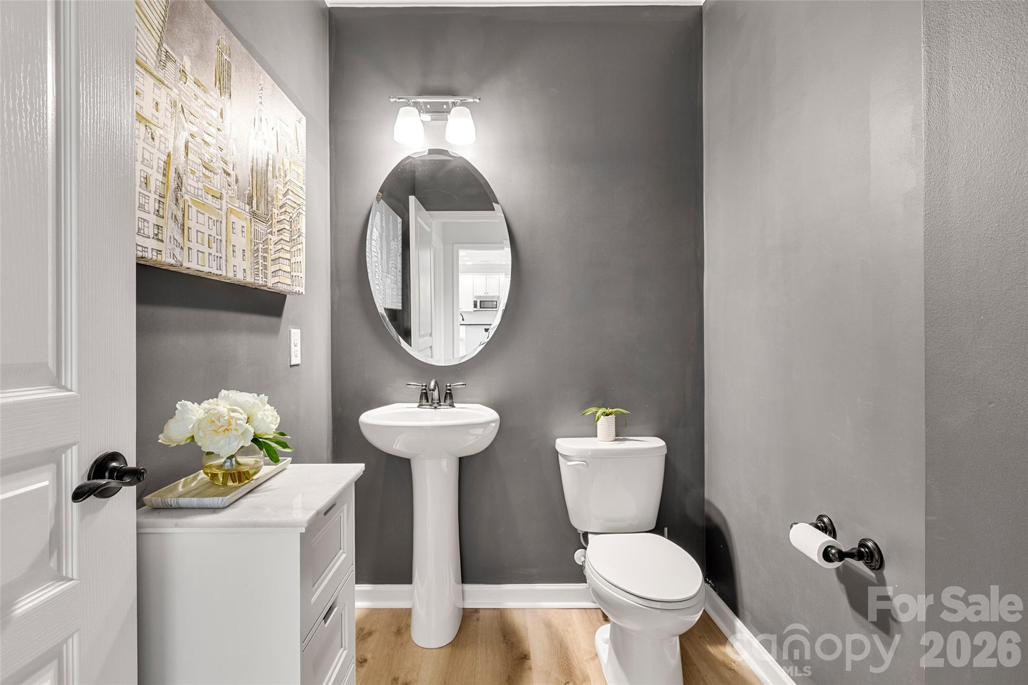 3534 Jumprock Road Fort Mill, SC 29707 - Photo 17 of 36 a bathroom with a toilet a sink and a mirror