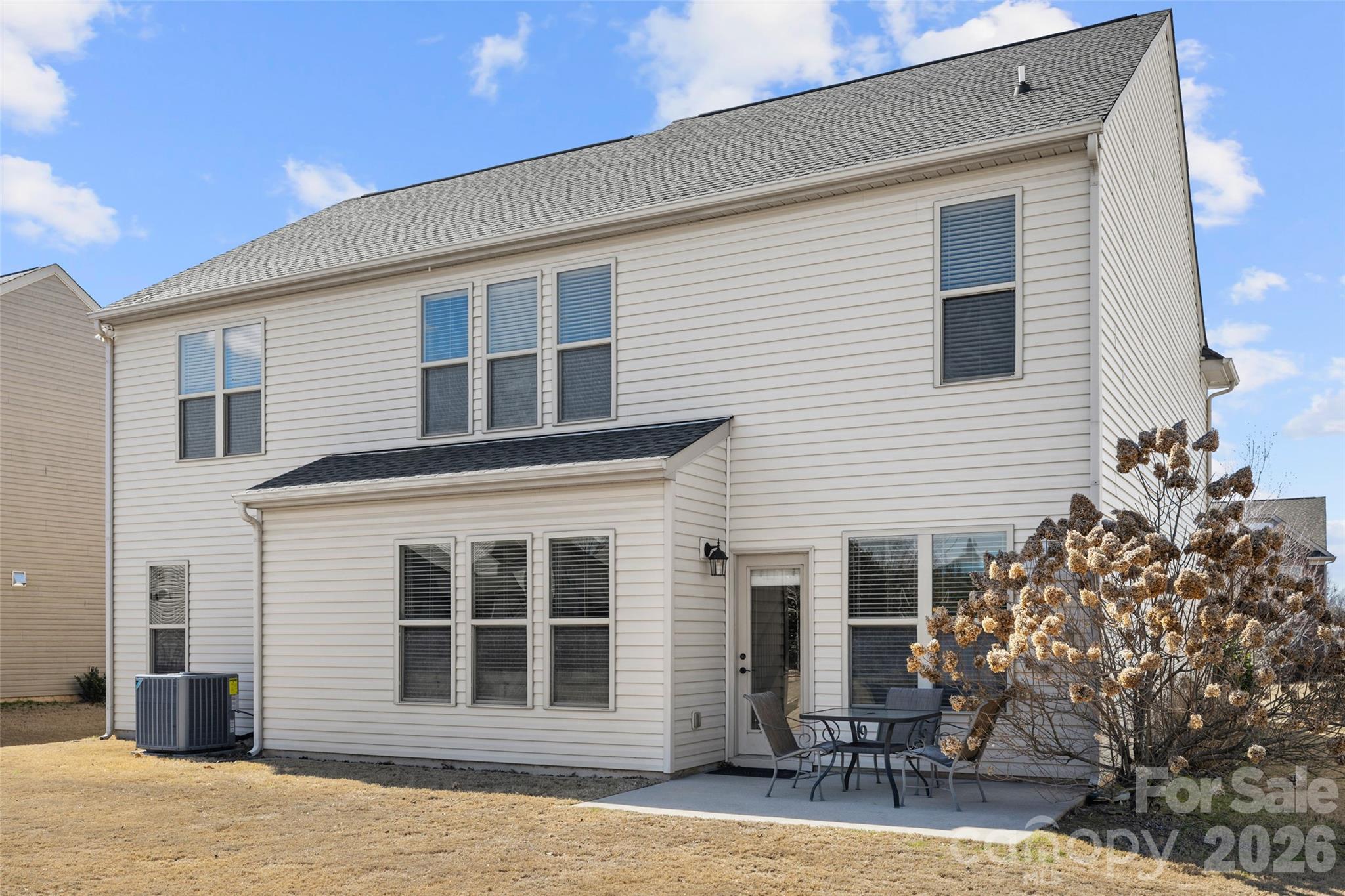3534 Jumprock Road Fort Mill, SC 29707 - Photo 32 of 36 a front view of a house with large windows