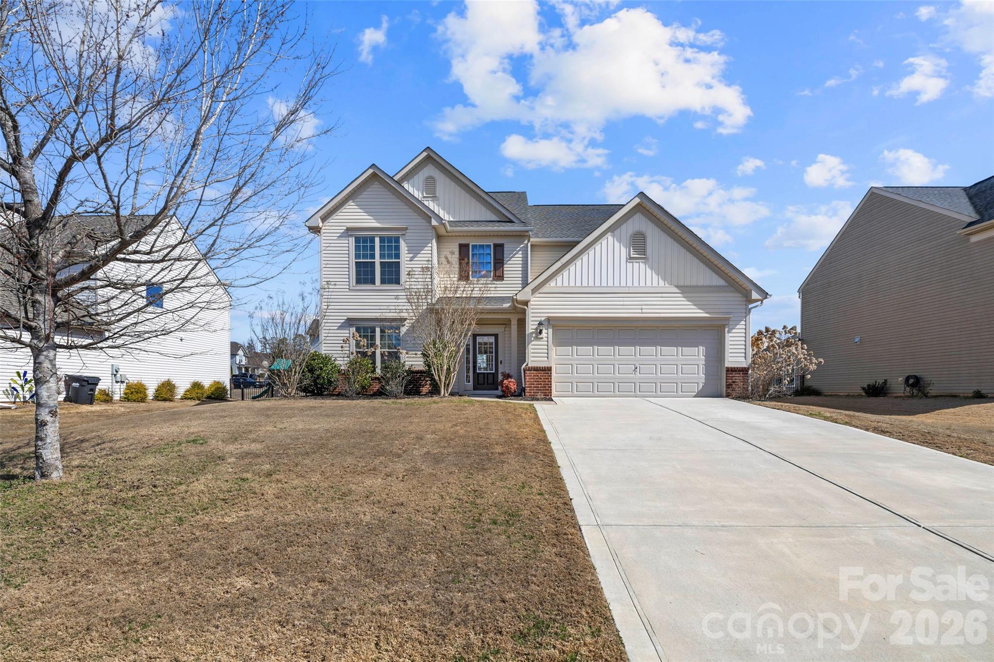 3534 Jumprock Road Fort Mill, SC 29707 - Photo 5 of 36 a front view of a house with a yard and garage