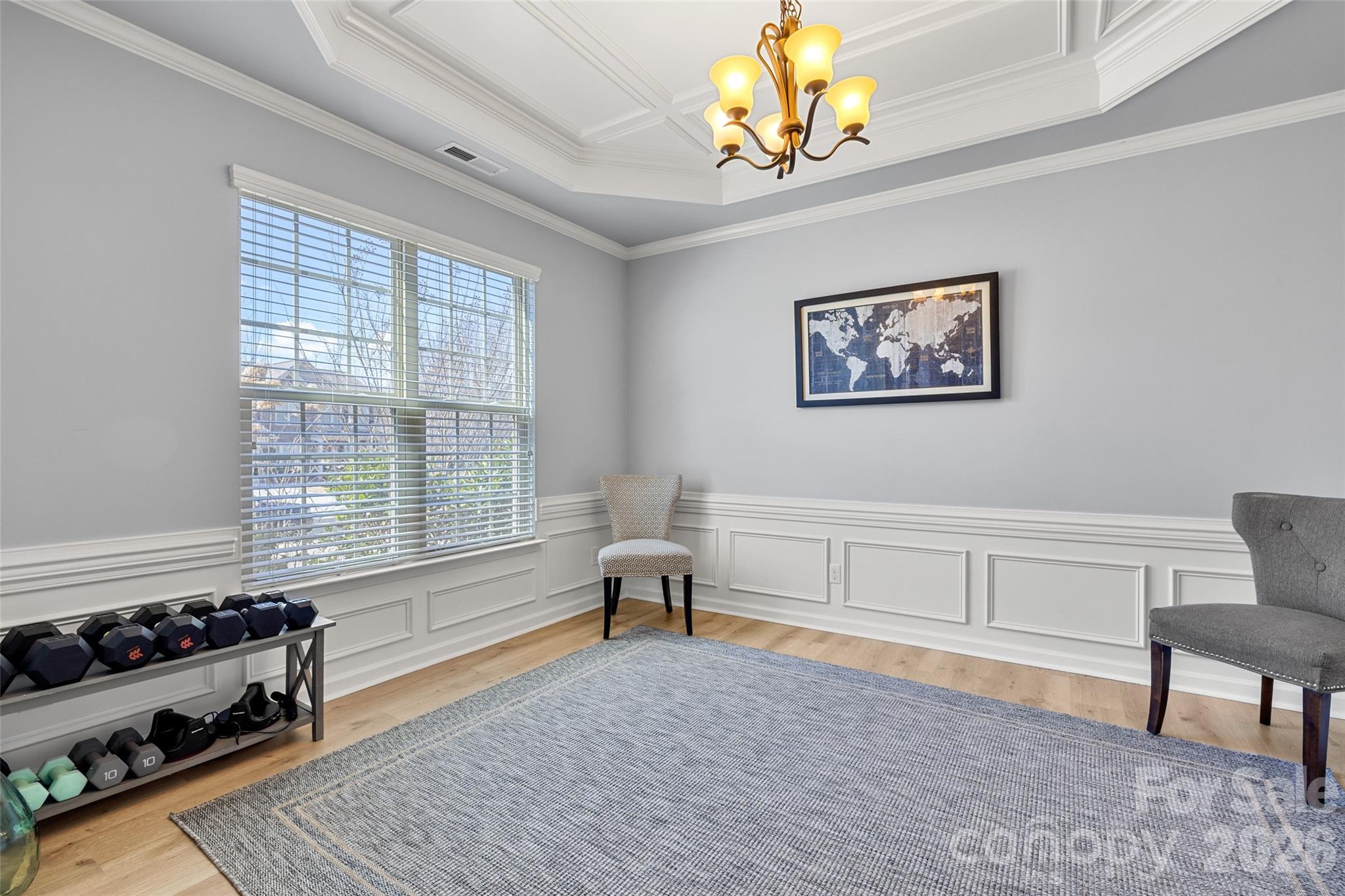 3534 Jumprock Road Fort Mill, SC 29707 - Photo 8 of 36 a living room with furniture and a wooden floor