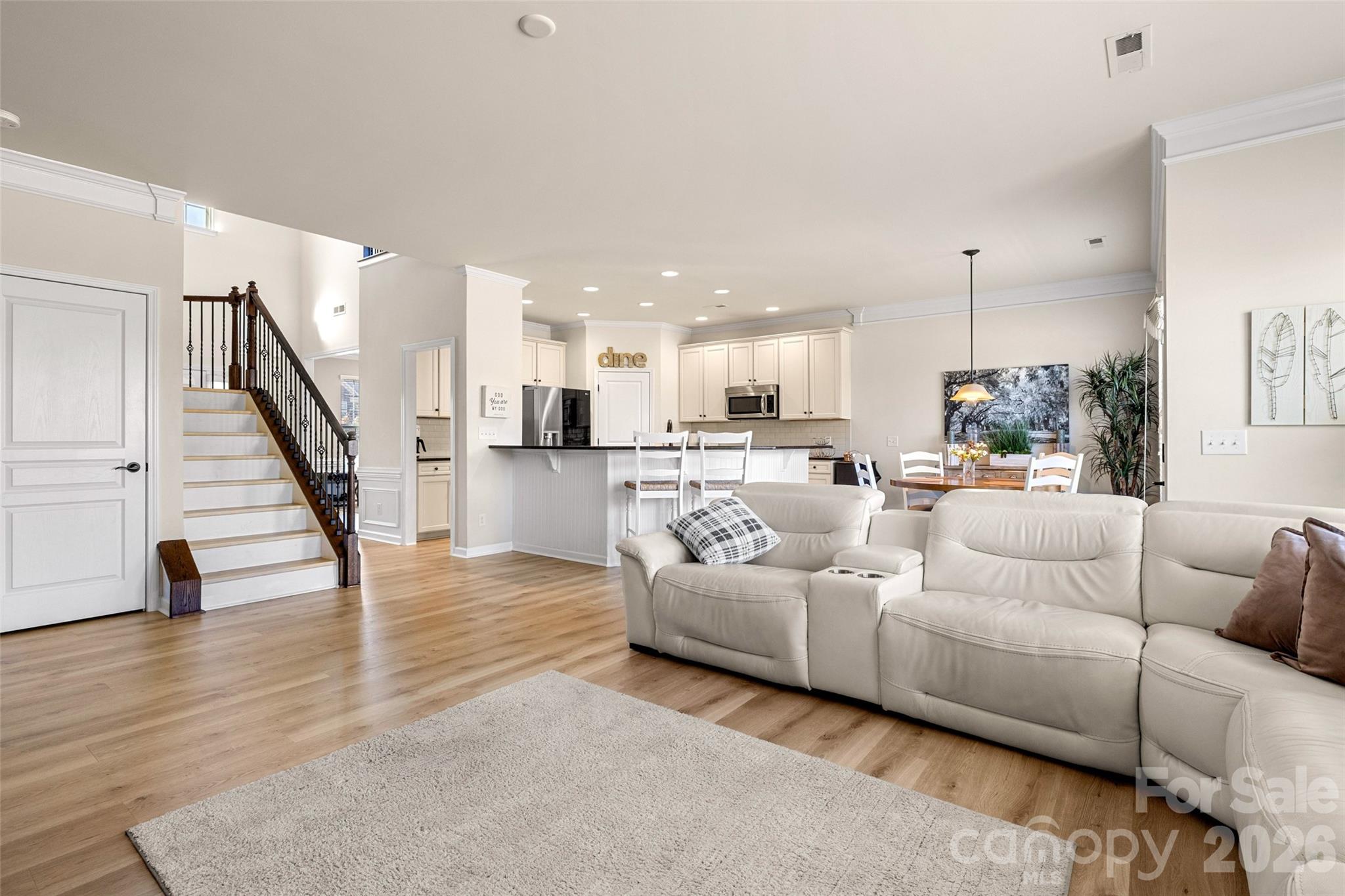 3534 Jumprock Road Fort Mill, SC 29707 - Photo 9 of 36 a living room with furniture and wooden floor