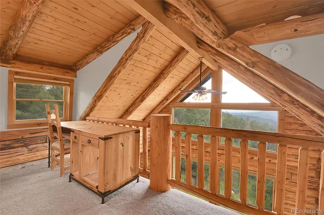 a view of an empty room with stairs