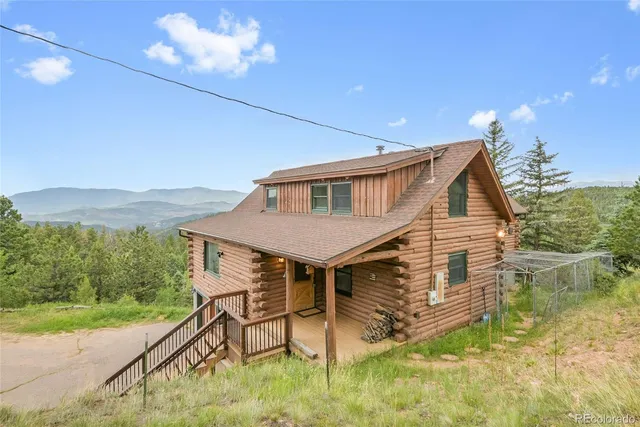 a view of balcony with wooden floor and lake view