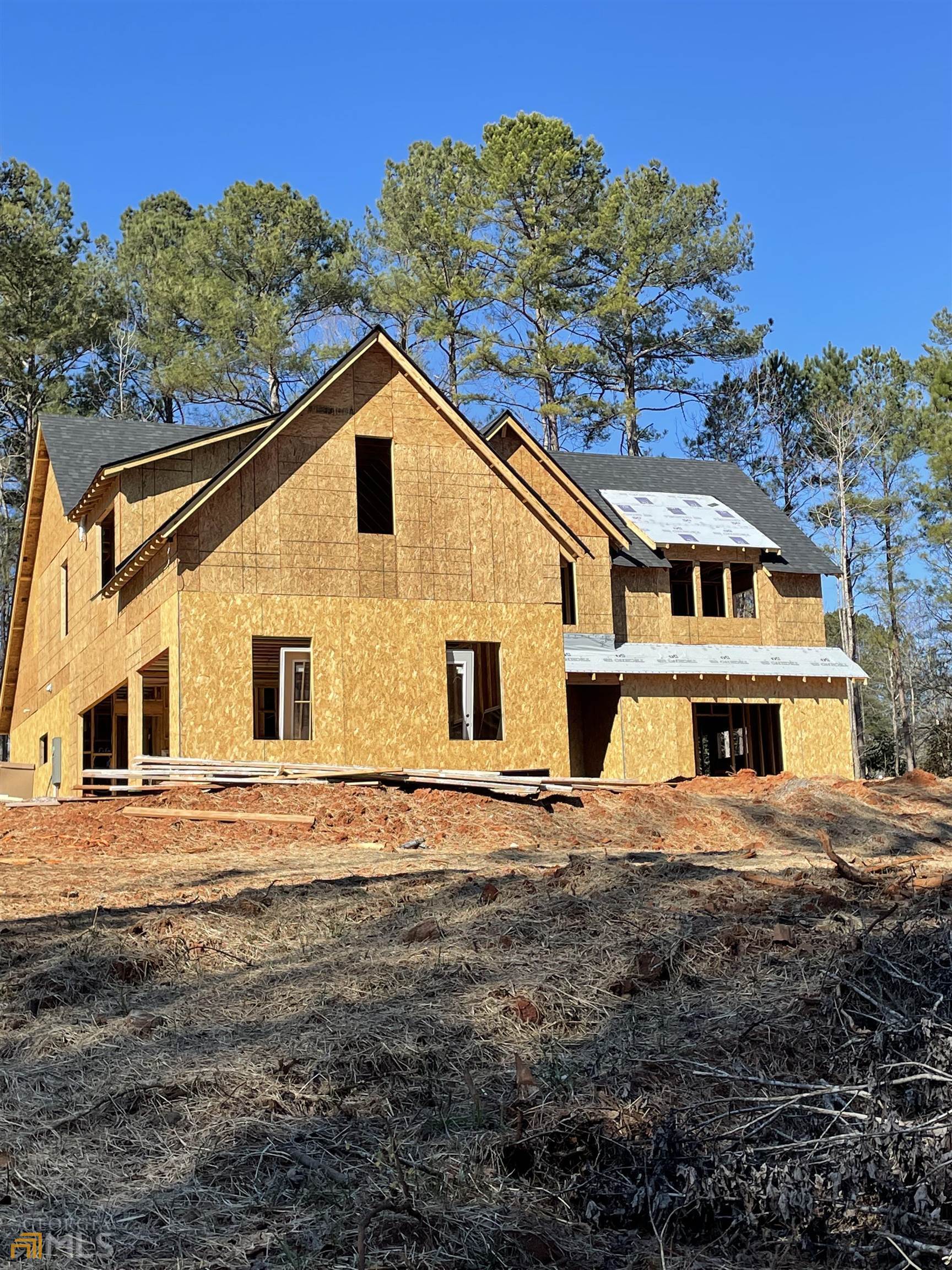 125 Windchime Way, Unit 31 Tyrone, GA 30290 - Photo 1 of 1 a front view of a house with a yard