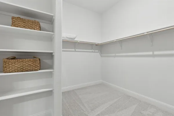 a view of an empty walk in closet