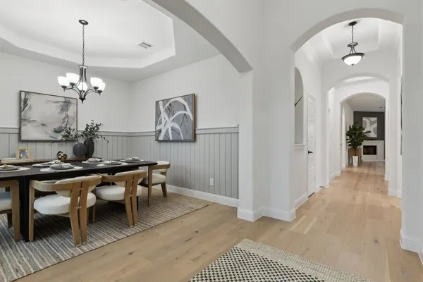 a bathroom with a sink and vanity