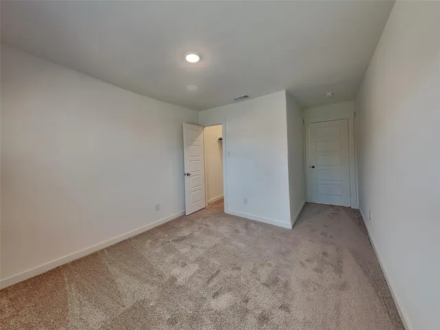 an empty room with an entryway