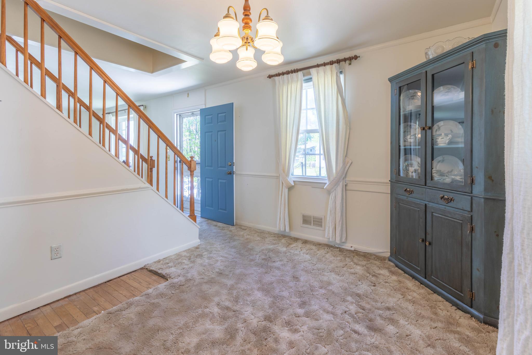 1813 Cromwood Road Baltimore, MD 21234 - Photo 14 of 32 Dining room (hardwood floors under carpet)