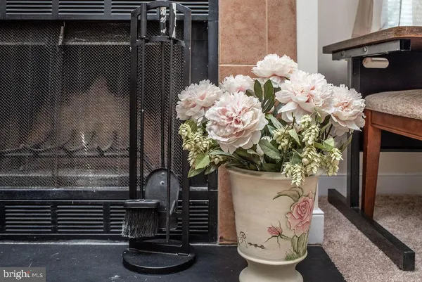 a vase of flowers sitting on a table