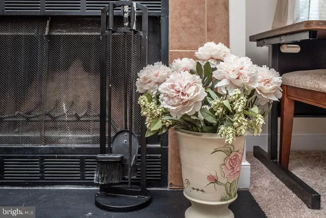 a vase of flowers sitting on a table