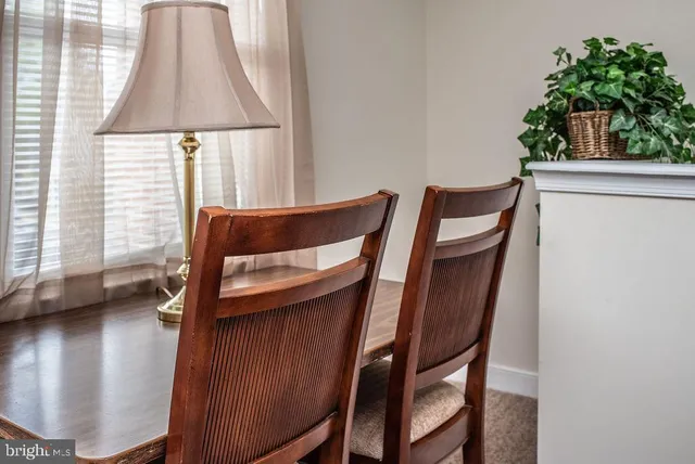 a view of entryway with wooden floor and chair