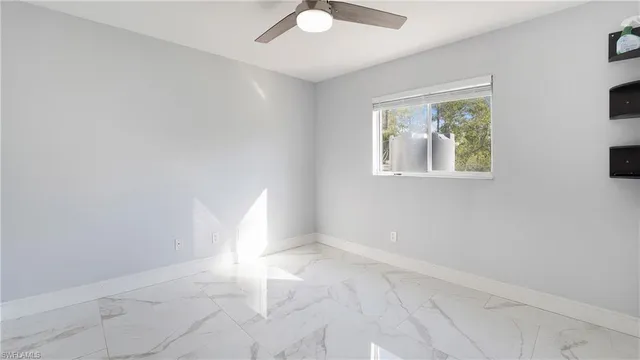 an empty room with windows