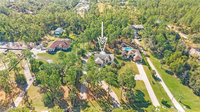 a backyard of a house with lots of green space