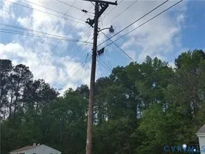 a view of a yard from a corridor