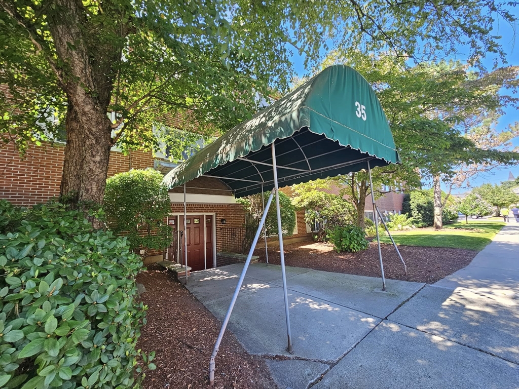 35 Prospect Street, Unit 215 Woburn, MA 01801 - Photo 26 of 37 a view of a backyard