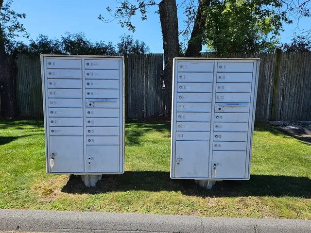 a view of street with parked cars