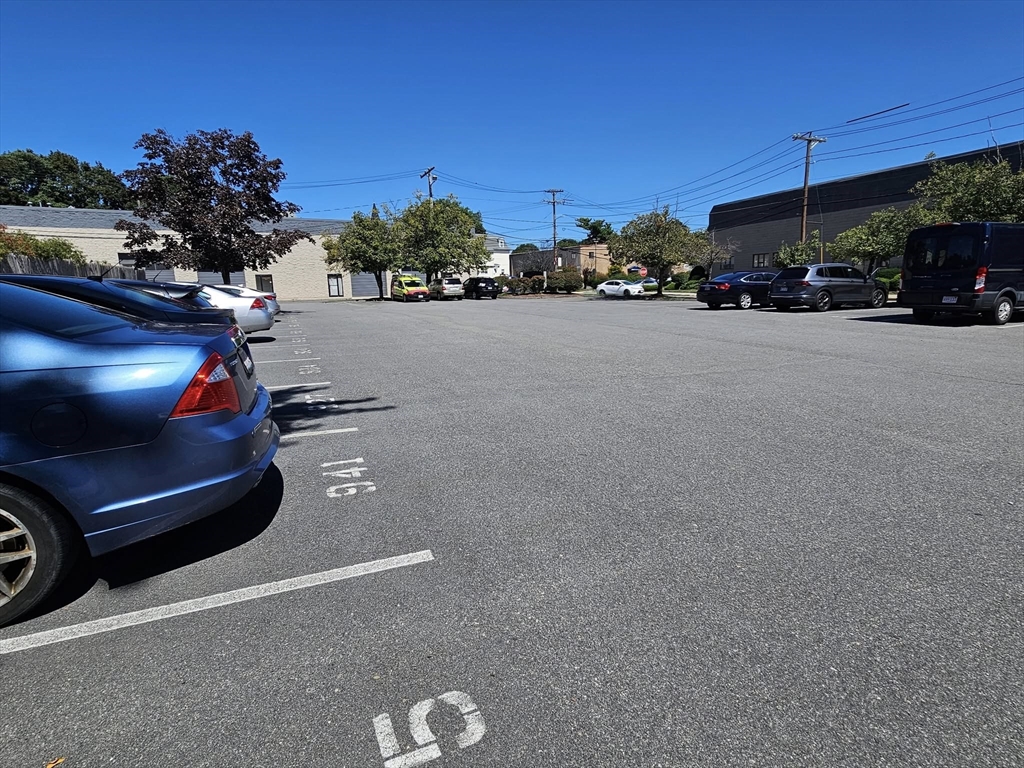 35 Prospect Street, Unit 215 Woburn, MA 01801 - Photo 30 of 37 a view of street with parked cars