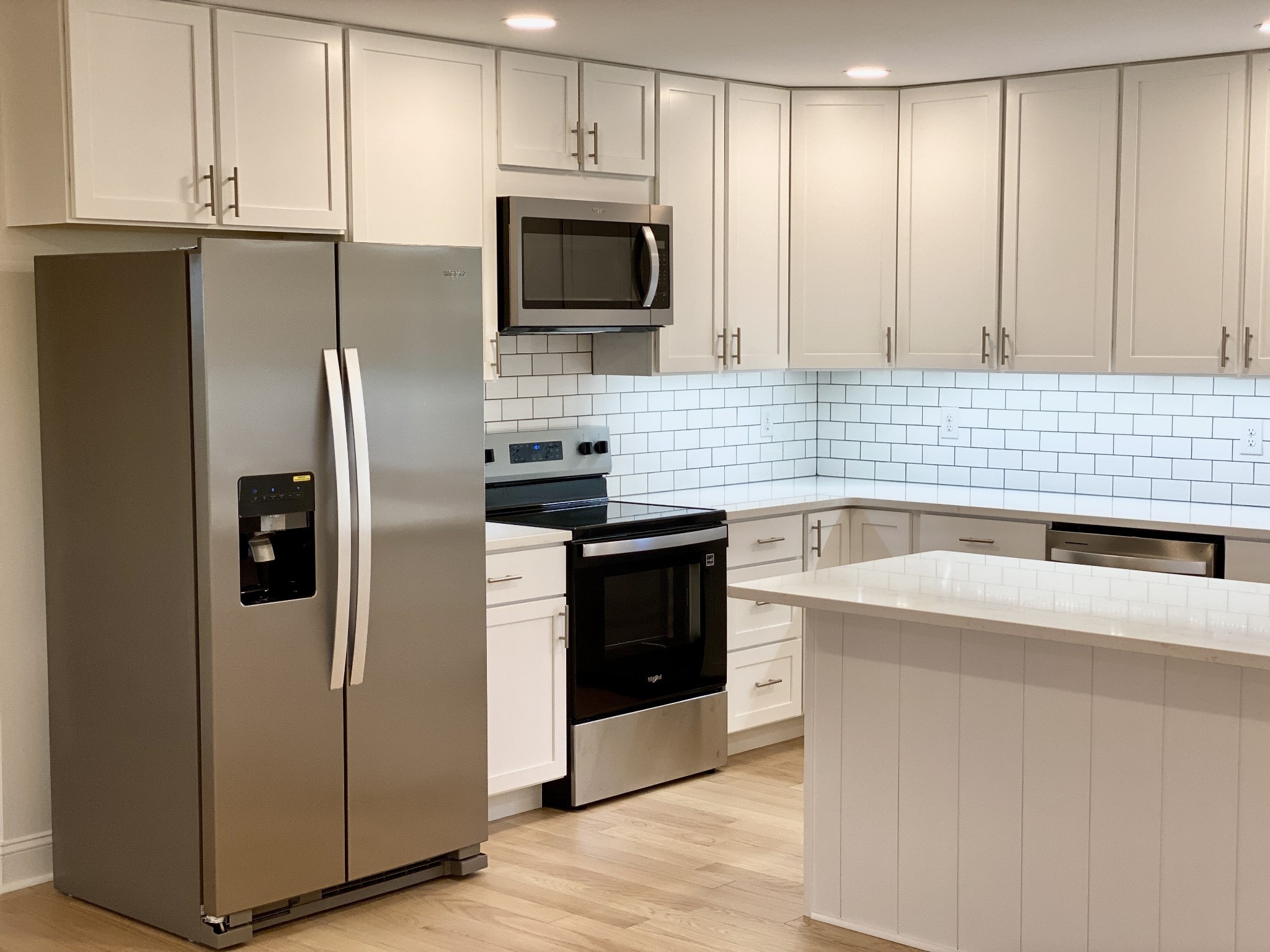 25 Ferguson Hollow Road Chestnut Mound, TN 38552 - Photo 11 of 49 a kitchen with a sink stove and refrigerator