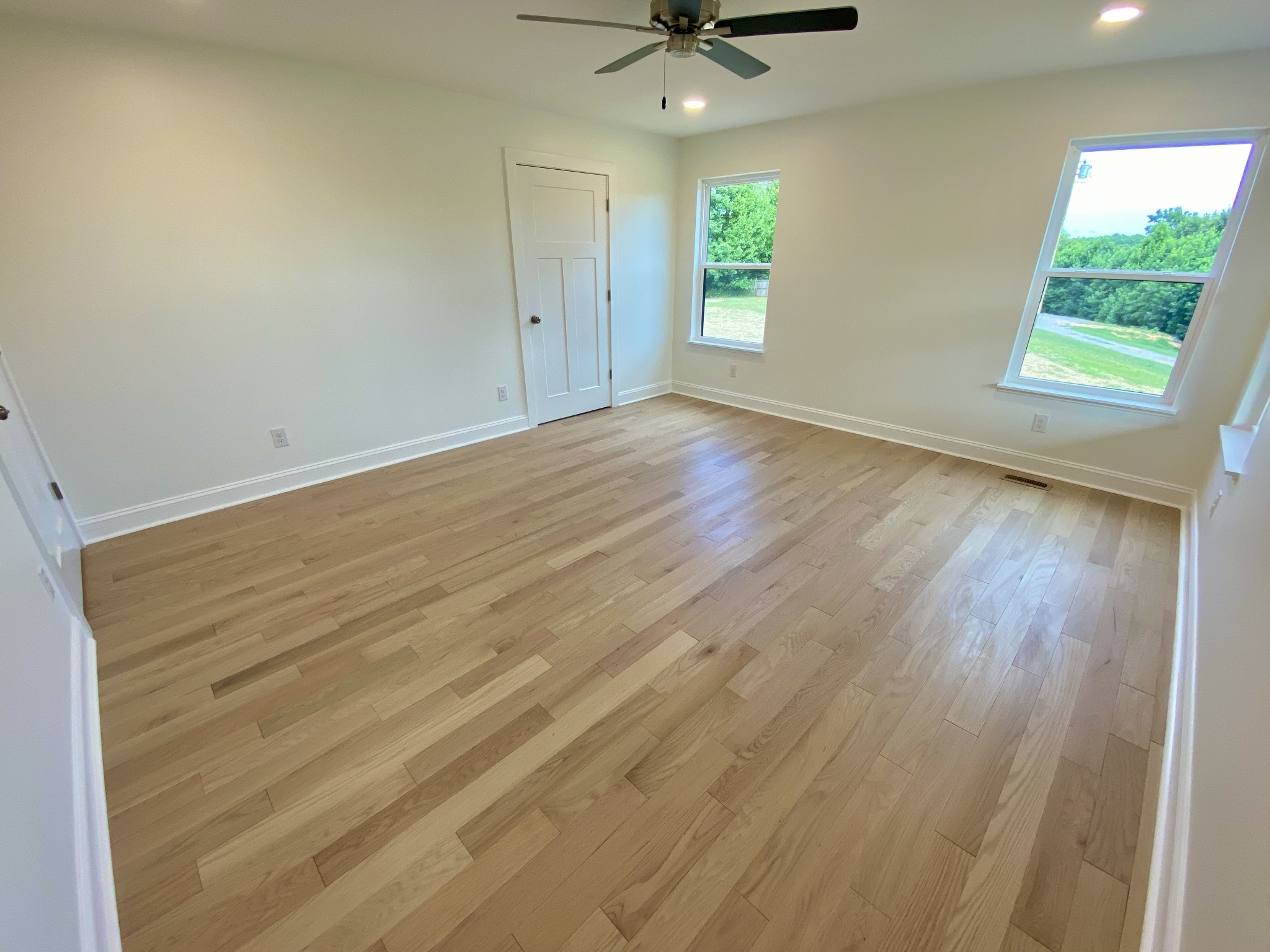 25 Ferguson Hollow Road Chestnut Mound, TN 38552 - Photo 15 of 49 wooden floor in an empty room with a window