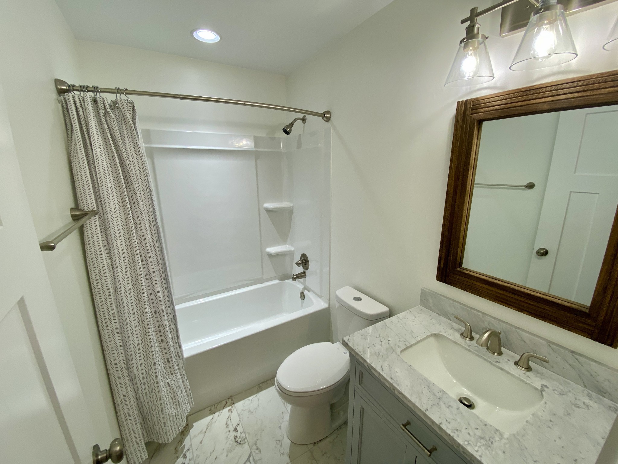 25 Ferguson Hollow Road Chestnut Mound, TN 38552 - Photo 28 of 49 a bathroom with a sink toilet and shower