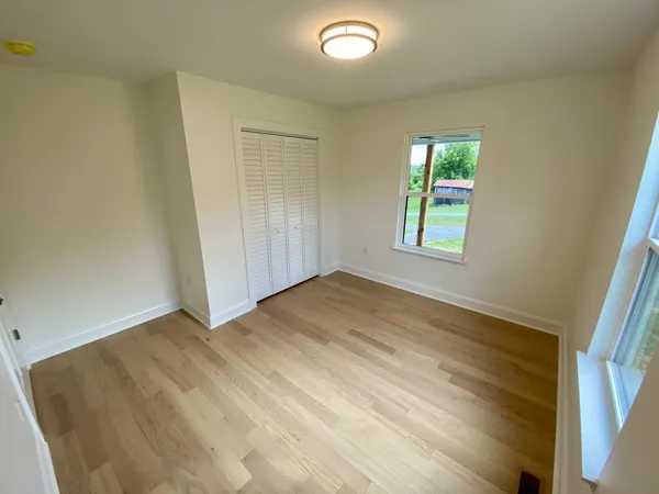 an empty room with windows