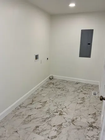 a view of a room with an empty space