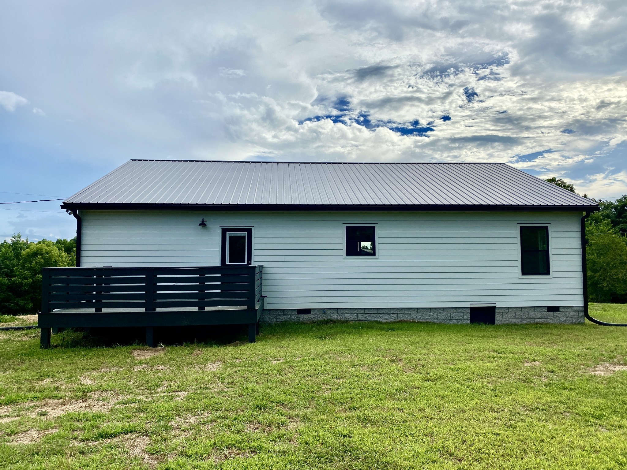 25 Ferguson Hollow Road Chestnut Mound, TN 38552 - Photo 36 of 49 a front view of a house with a yard