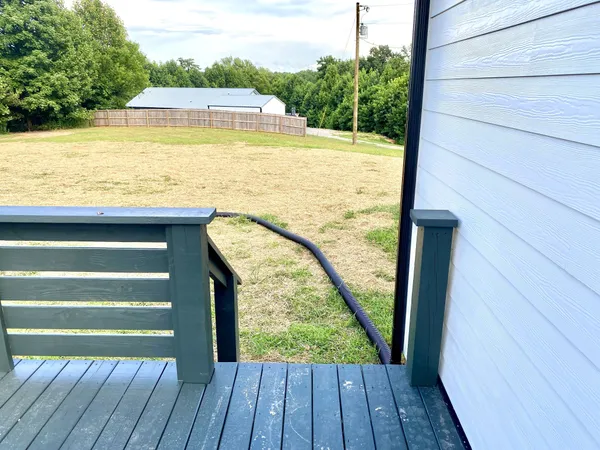a view of swimming pool from a balcony