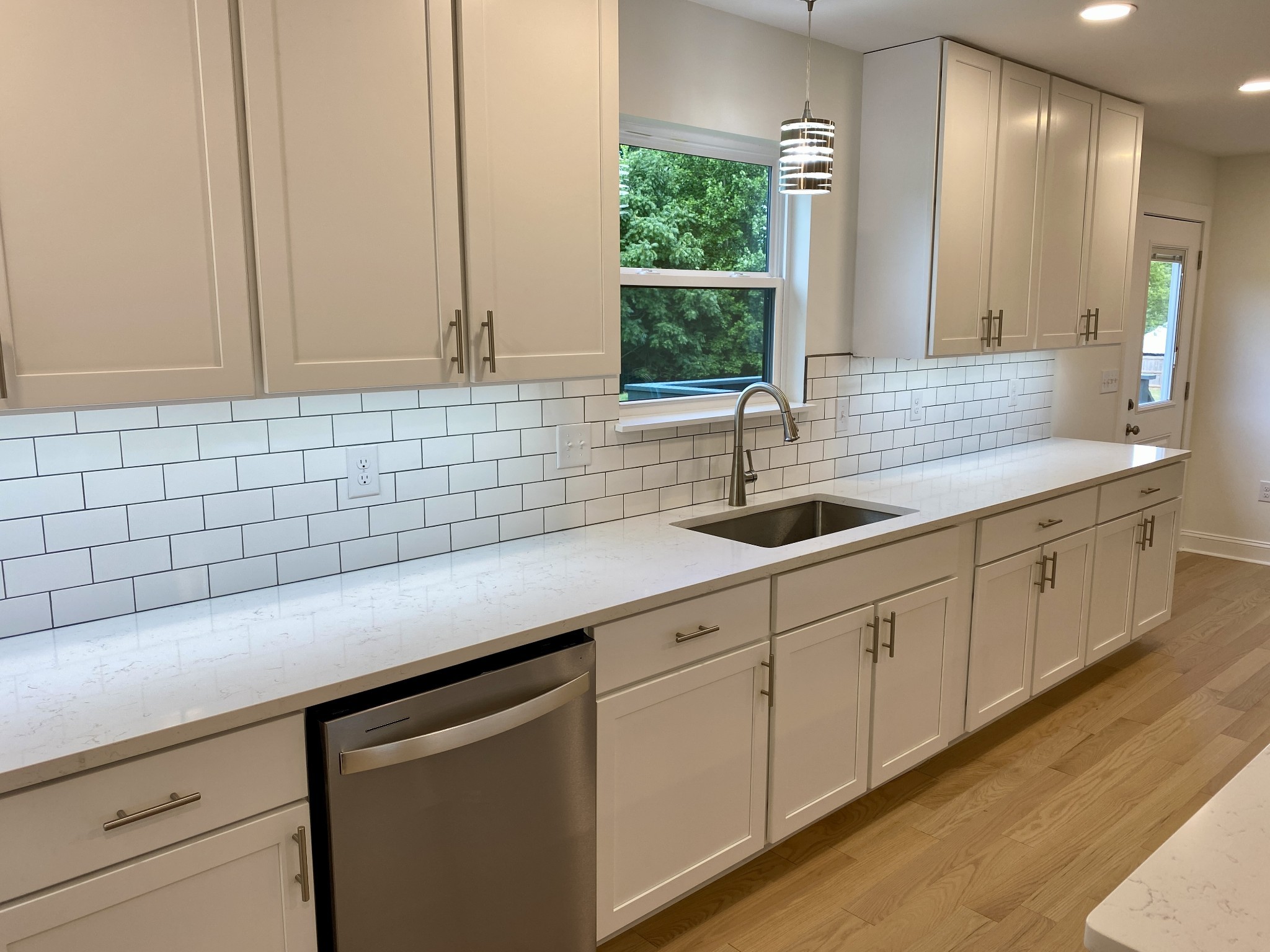 25 Ferguson Hollow Road Chestnut Mound, TN 38552 - Photo 10 of 49 a kitchen with a sink and cabinets