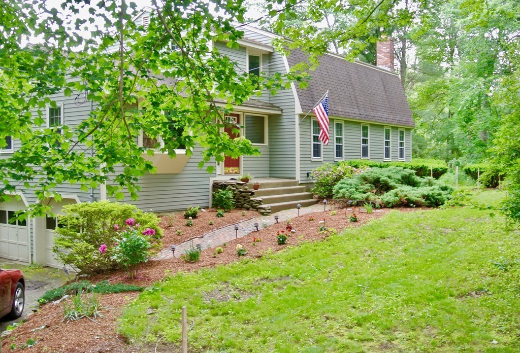 202 Pepperell Road Groton, MA 01450 - Photo 1 of 30 a view of a house with a yard and plants