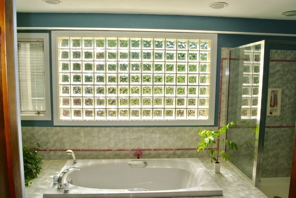 202 Pepperell Road Groton, MA 01450 - Photo 16 of 30 a bath tub sitting next to a window