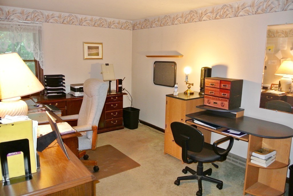 202 Pepperell Road Groton, MA 01450 - Photo 26 of 30 a view of a workspace with furniture and a window