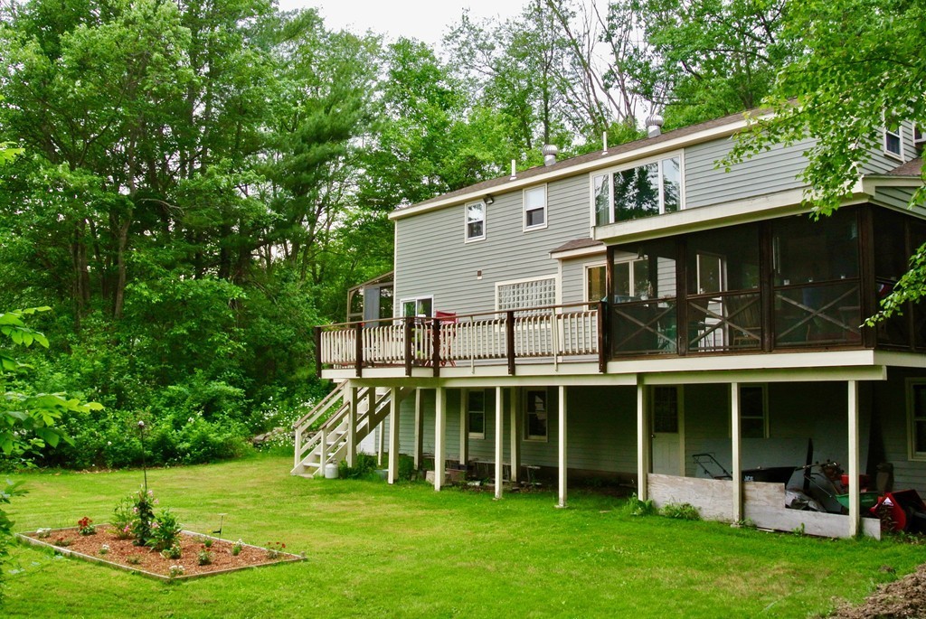 202 Pepperell Road Groton, MA 01450 - Photo 3 of 30 a view of a house with backyard and porch