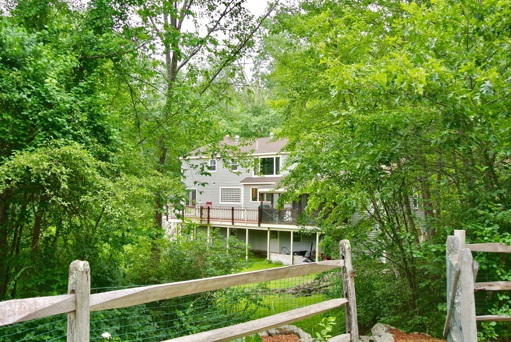 202 Pepperell Road Groton, MA 01450 - Photo 5 of 30 a balcony with an outdoor space
