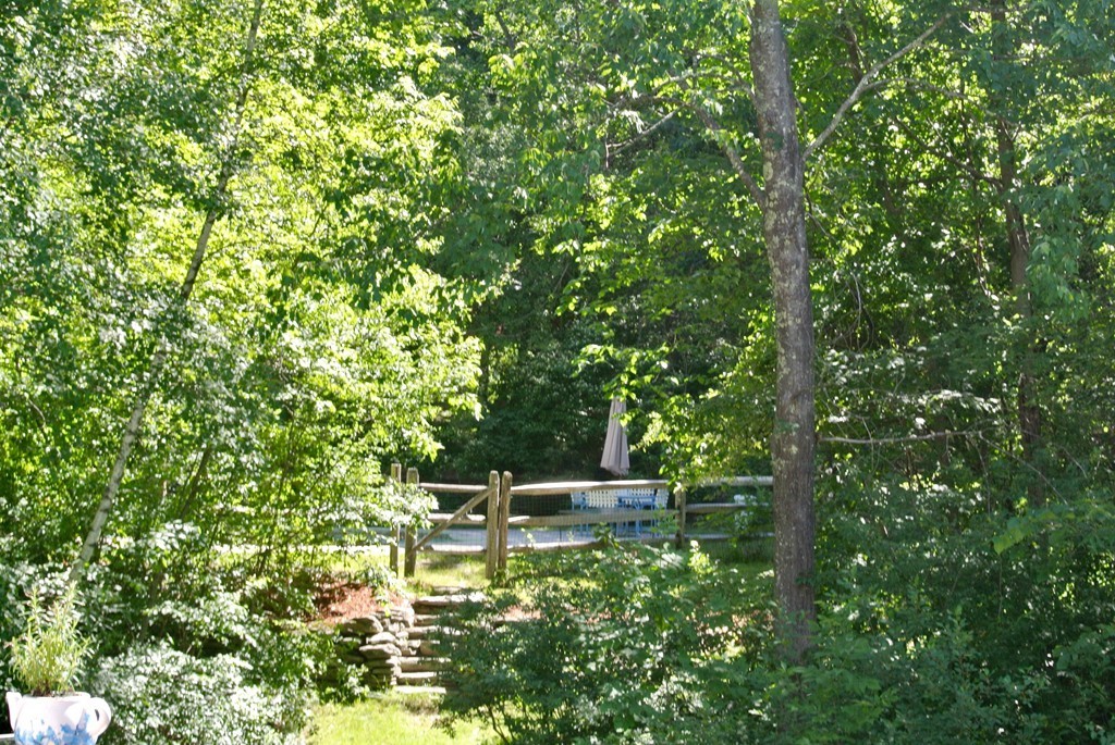 202 Pepperell Road Groton, MA 01450 - Photo 6 of 30 a balcony with a tree