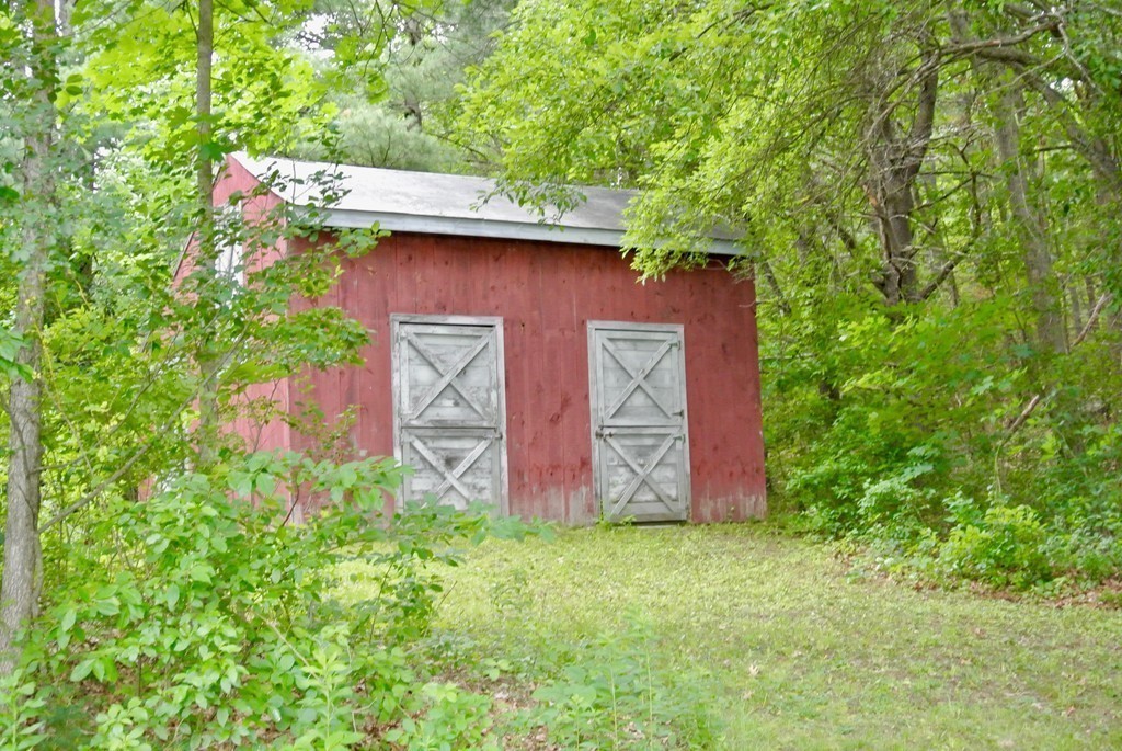 202 Pepperell Road Groton, MA 01450 - Photo 8 of 30 a view of door with deck and backyard