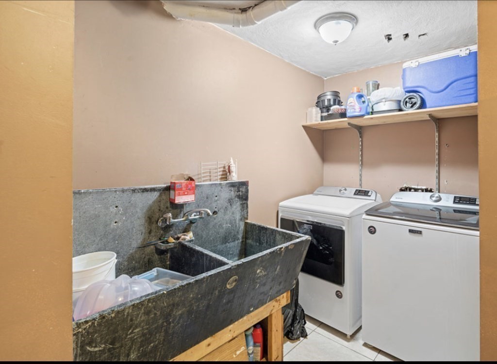 55 Austin Street Boston, MA 02136 - Photo 21 of 24 a utility room with dryer and washer
