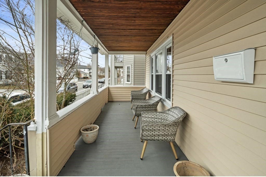 55 Austin Street Boston, MA 02136 - Photo 22 of 24 a porch with outdoor seating