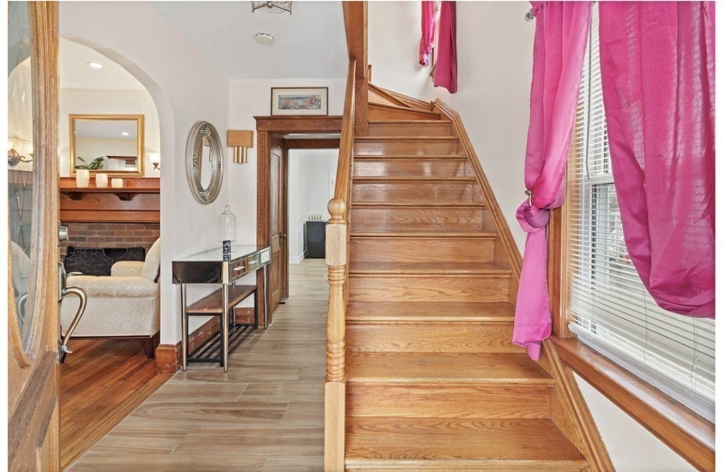 55 Austin Street Boston, MA 02136 - Photo 3 of 24 a view of entryway and hall with wooden floor