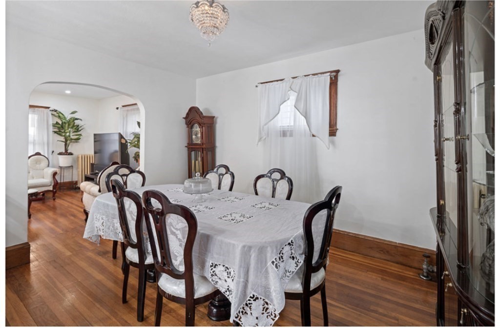 55 Austin Street Boston, MA 02136 - Photo 4 of 24 a view of a a dining room with furniture and wooden floor