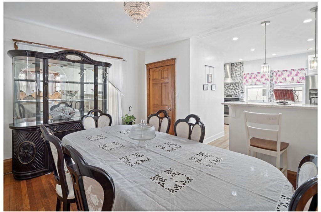 55 Austin Street Boston, MA 02136 - Photo 5 of 24 a view of a dining room with furniture window and outside view