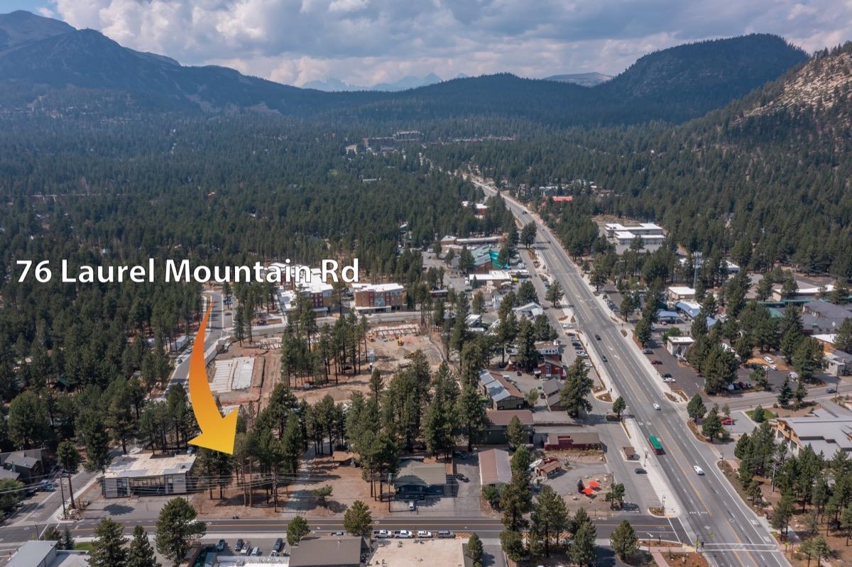 76 Laurel Mountain Road Mammoth Lakes, CA 93546 - Photo 9 of 30 Aerial view of property and surrounding area featuring mountains and a forest