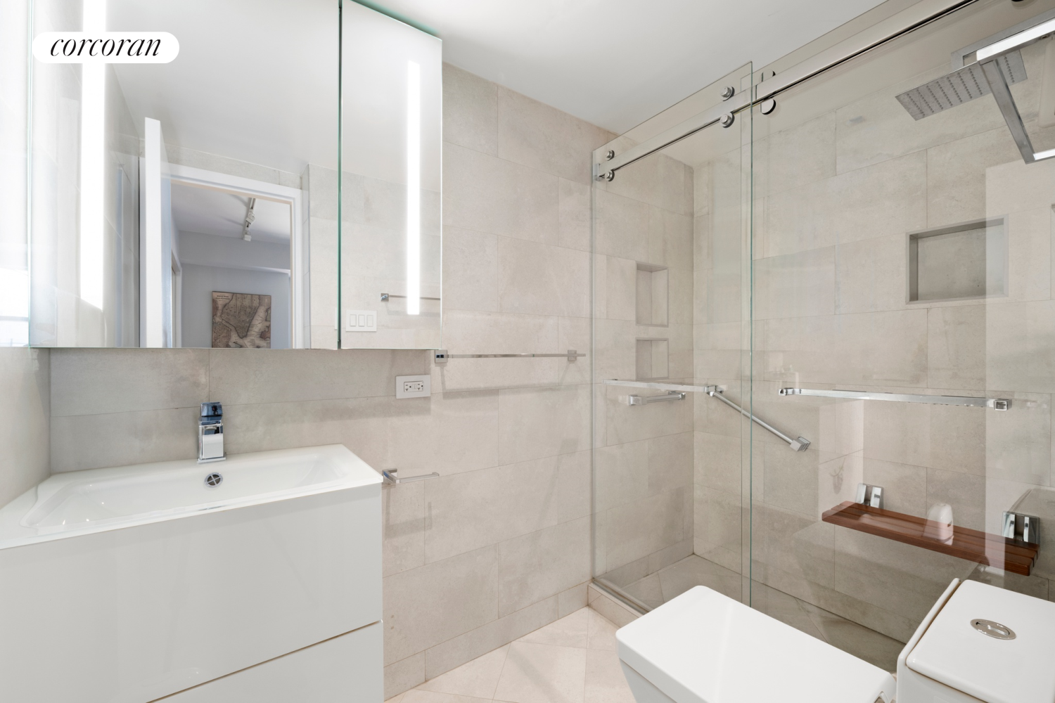 345 East 56th Street, Unit 21F Manhattan, NY 10022 - Photo 6 of 9 a bathroom with a sink toilet and shower