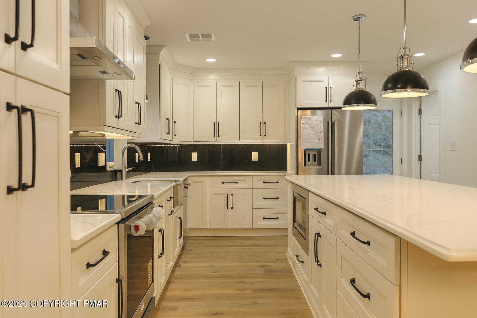 1131 Mink Court Bushkill, PA 18324 - Photo 11 of 63 11 Pantry Wall - Smart Storage