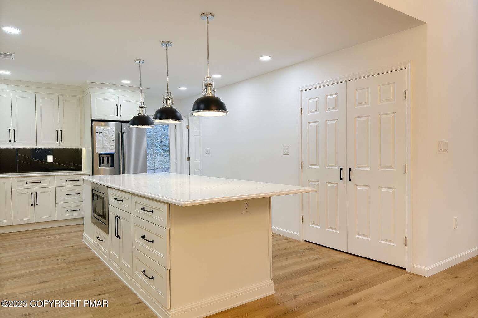 1131 Mink Court Bushkill, PA 18324 - Photo 13 of 63 13 Kitchen and Laundry Closet