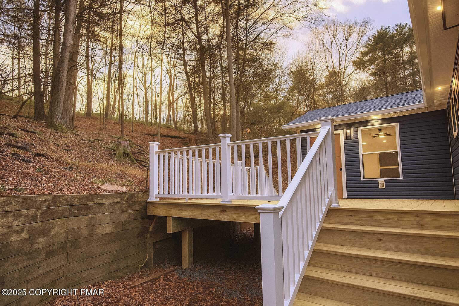 1131 Mink Court Bushkill, PA 18324 - Photo 19 of 63 19 Deck Stairs to Kitchen Entry