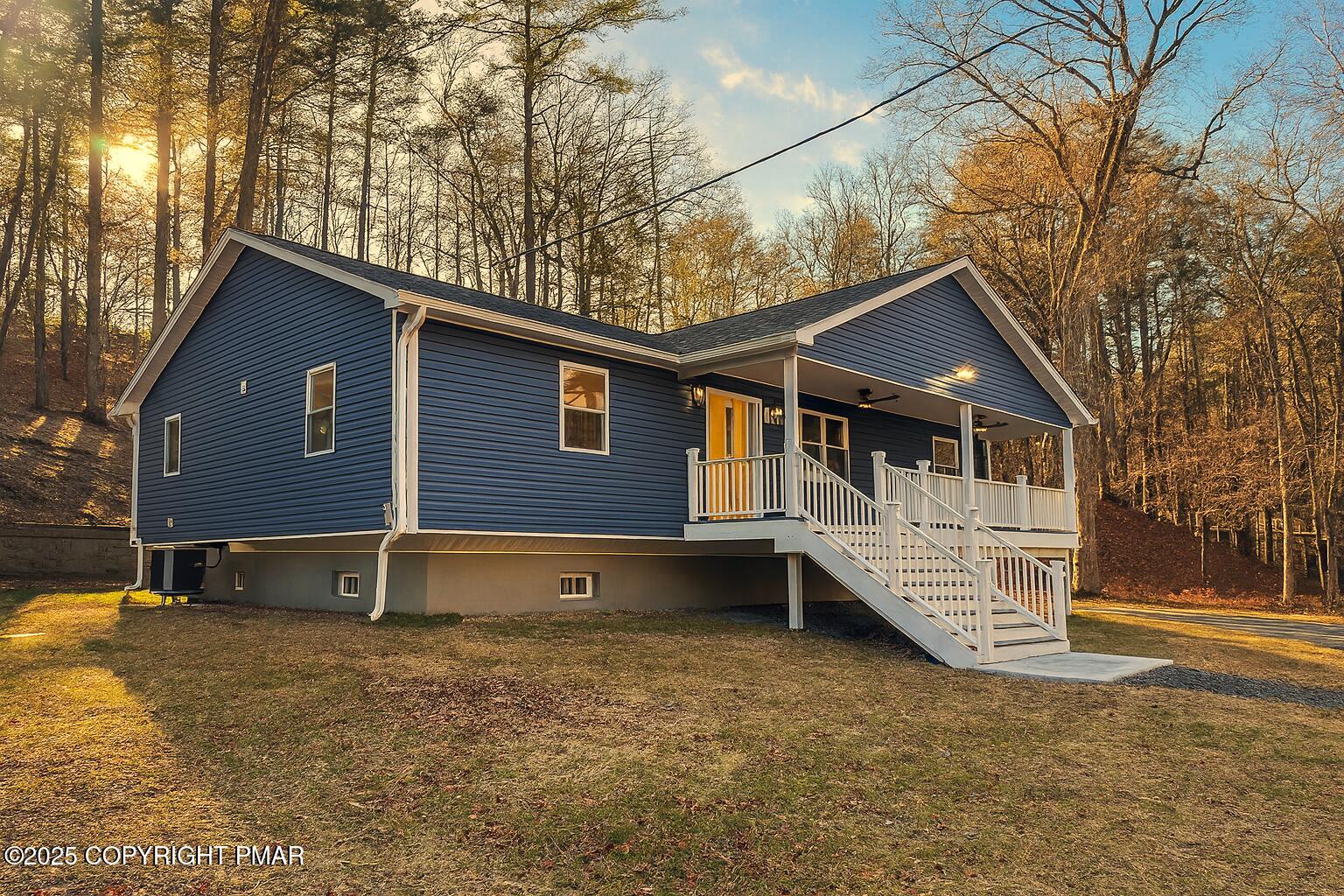 1131 Mink Court Bushkill, PA 18324 - Photo 57 of 63 57 Front Exterior - Afternoon Light